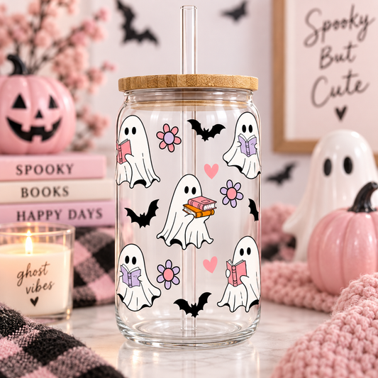 Bookish Ghosts Halloween glass can with bamboo lid and straw in a pink spooky setting