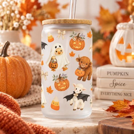 Cute Halloween Friends glass can with bamboo lid and straw in a cosy autumn Halloween setting