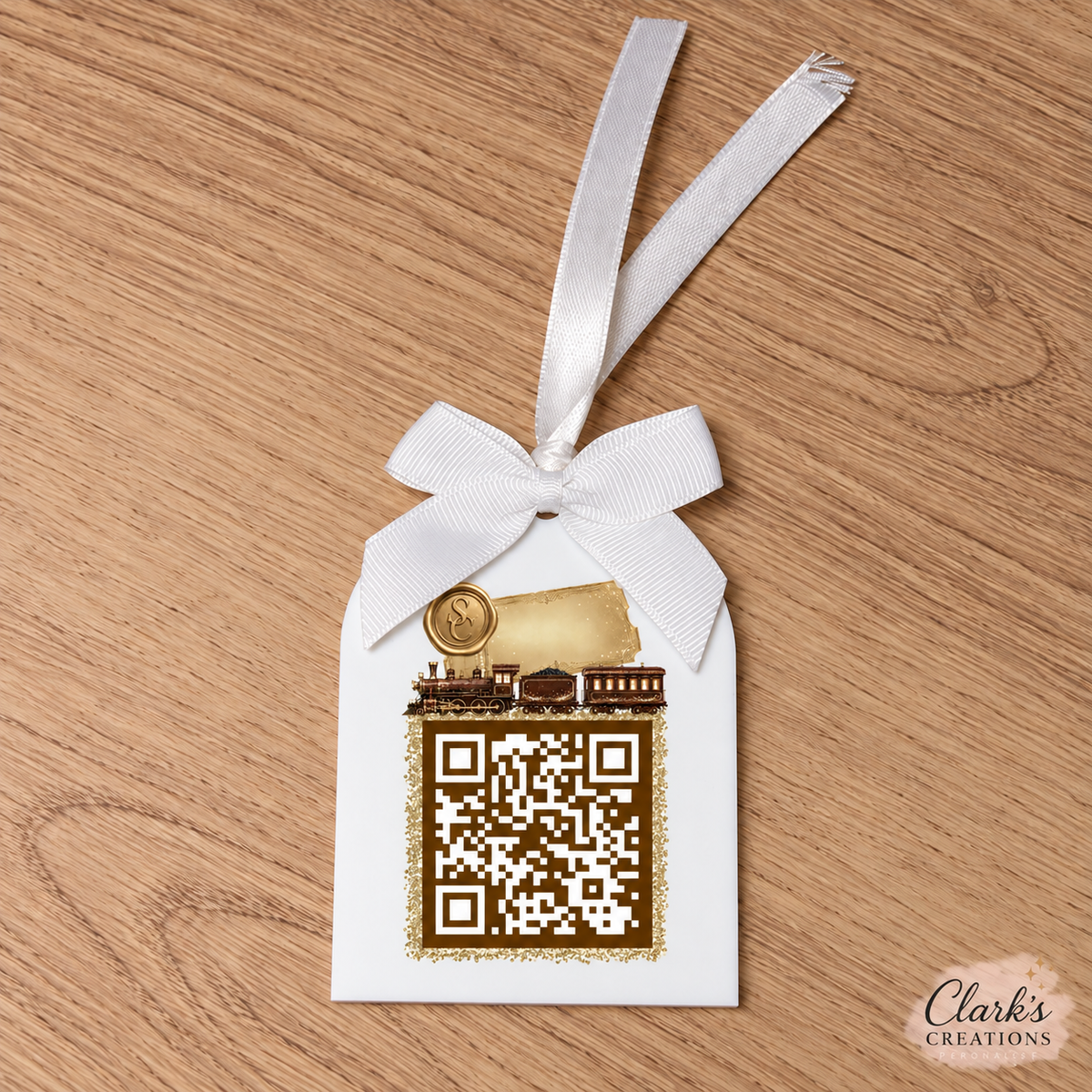 Brown Express Train Santa Tracker white acrylic arch with white ribbon and NORAD QR code
