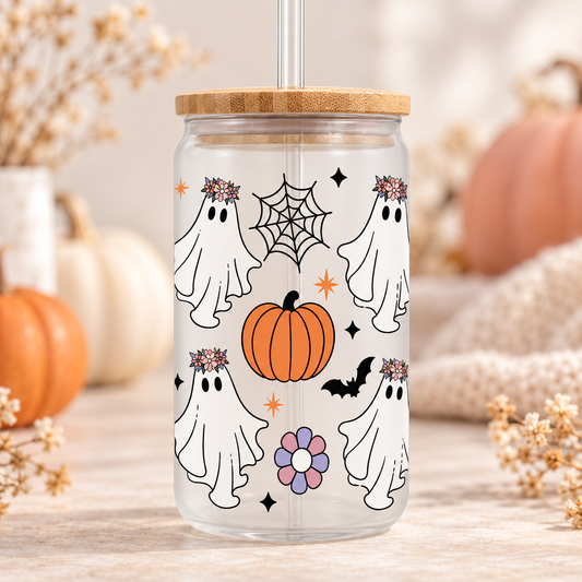 Floral Ghosts Halloween glass can with bamboo lid and straw in a soft autumn setting