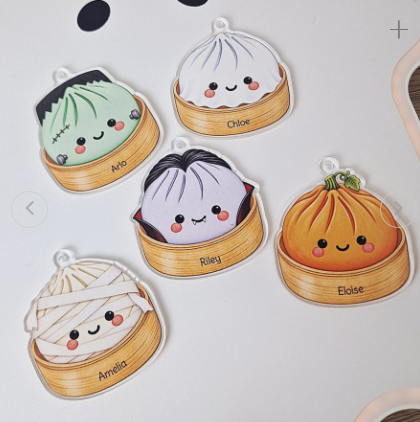 Personalised Halloween dumpling baubles on clear acrylic